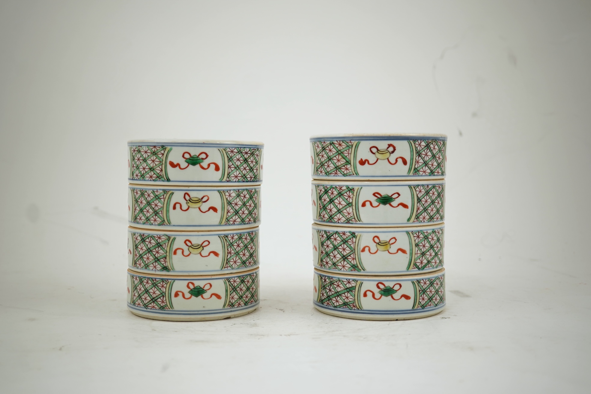 A pair of Chinese famille verte stacking containers, 18th/19th century